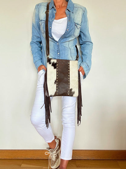 Bandolera Alcor. Adopta a este chocolatito.